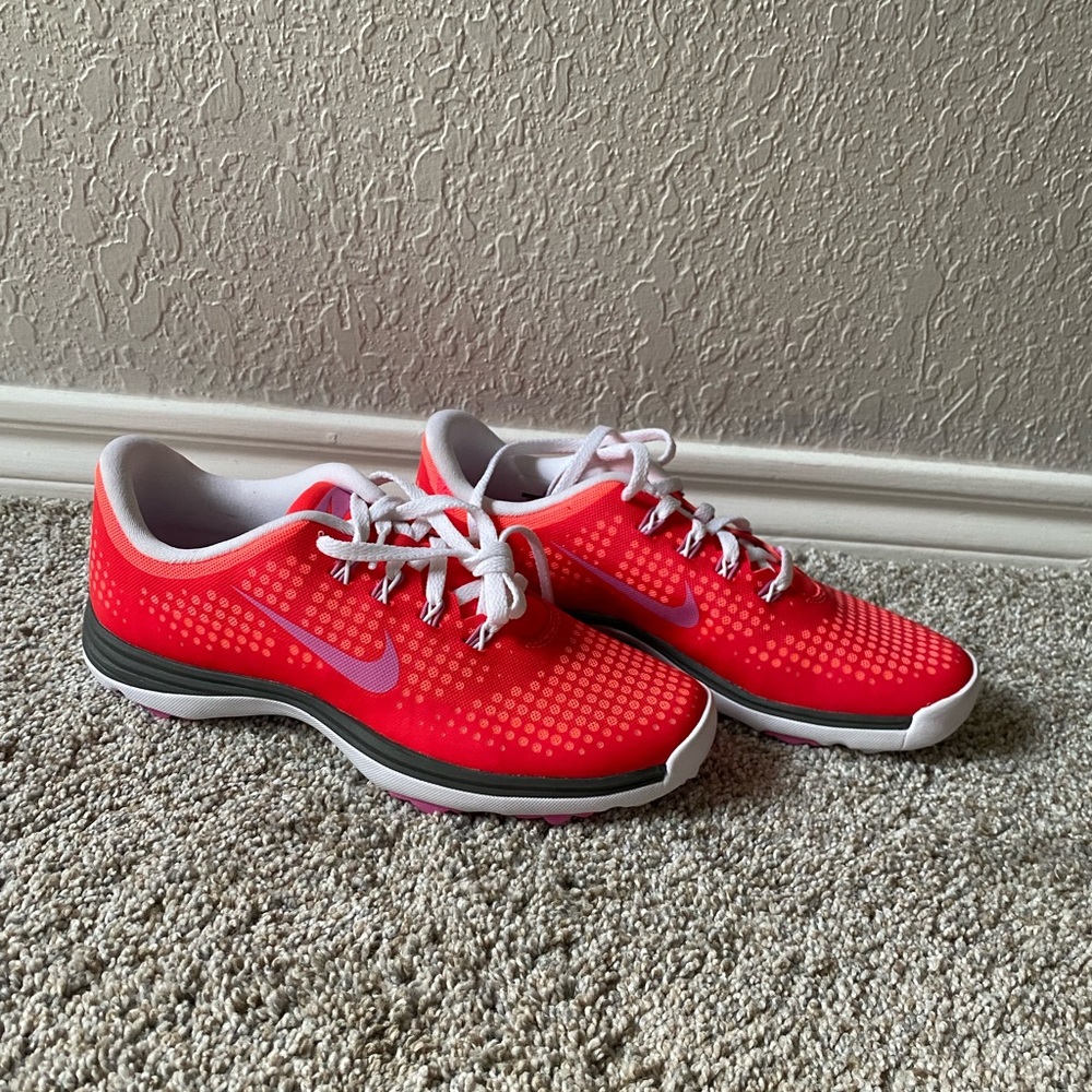 New without tags womens nike golf shoes pink and orange